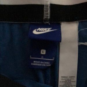 Turquoise and pink nike leggings